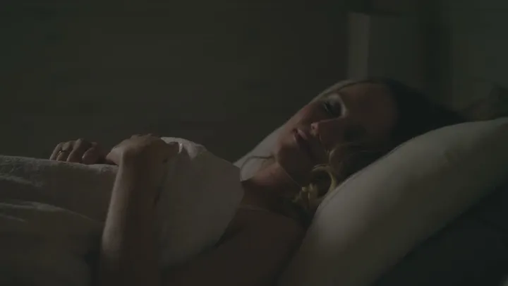 Woman resting in bed